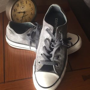 Converse brushed grey/metallic tennis shoes.